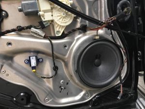 how to fix car speakers crackling