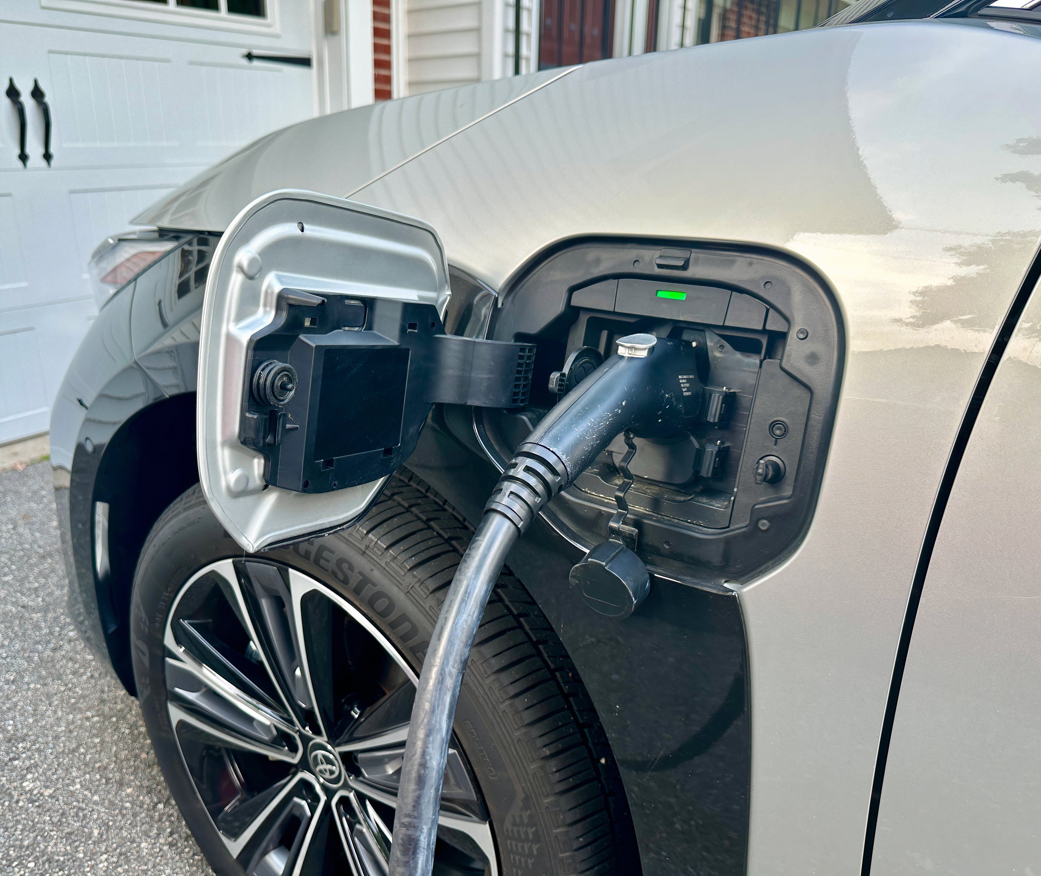 The 2024 Toyota bZ4X plugged-in and charging.