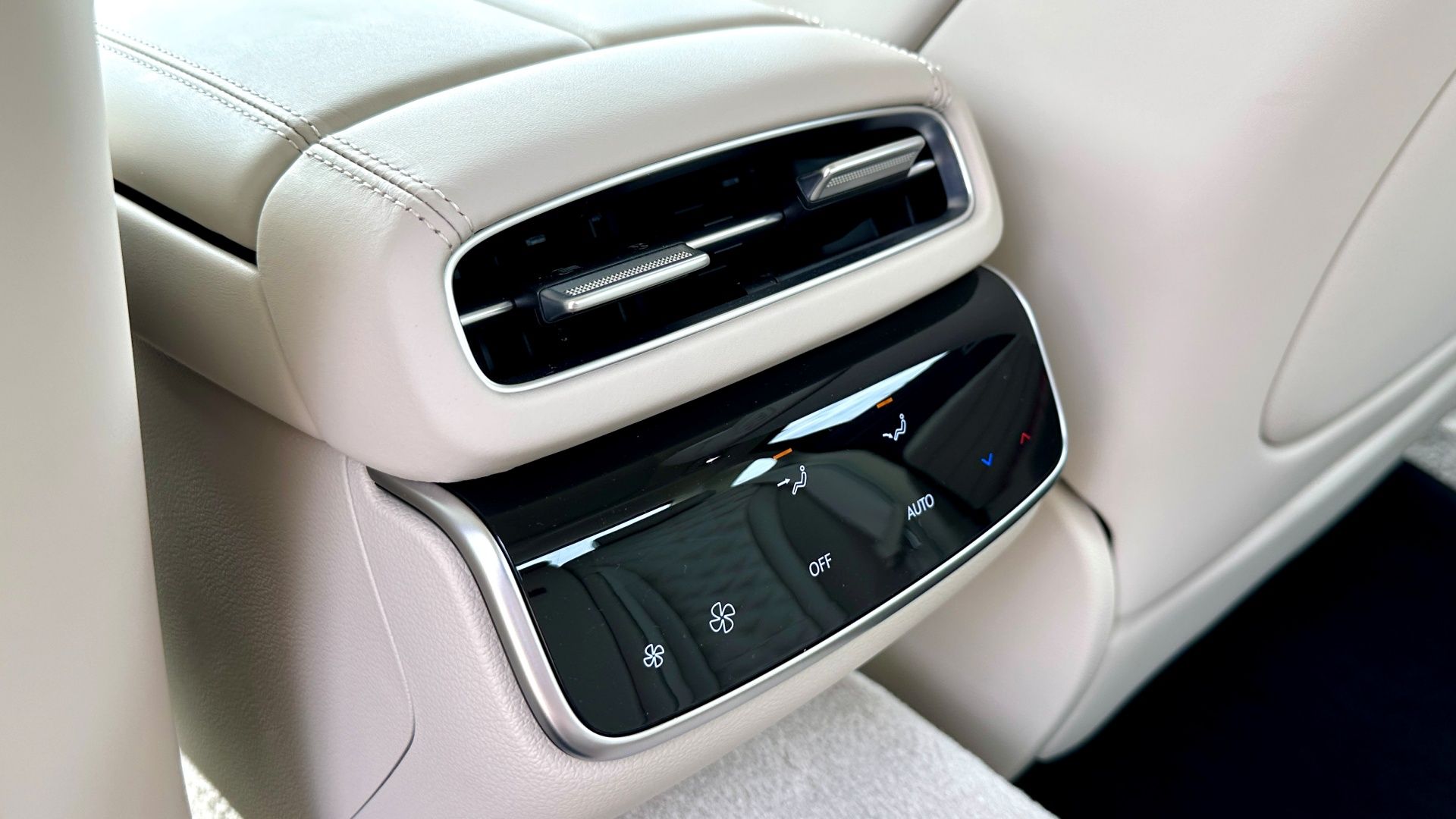 2025-genesis-g80-rear-controls The 2025 Genesis G80 rear climate control