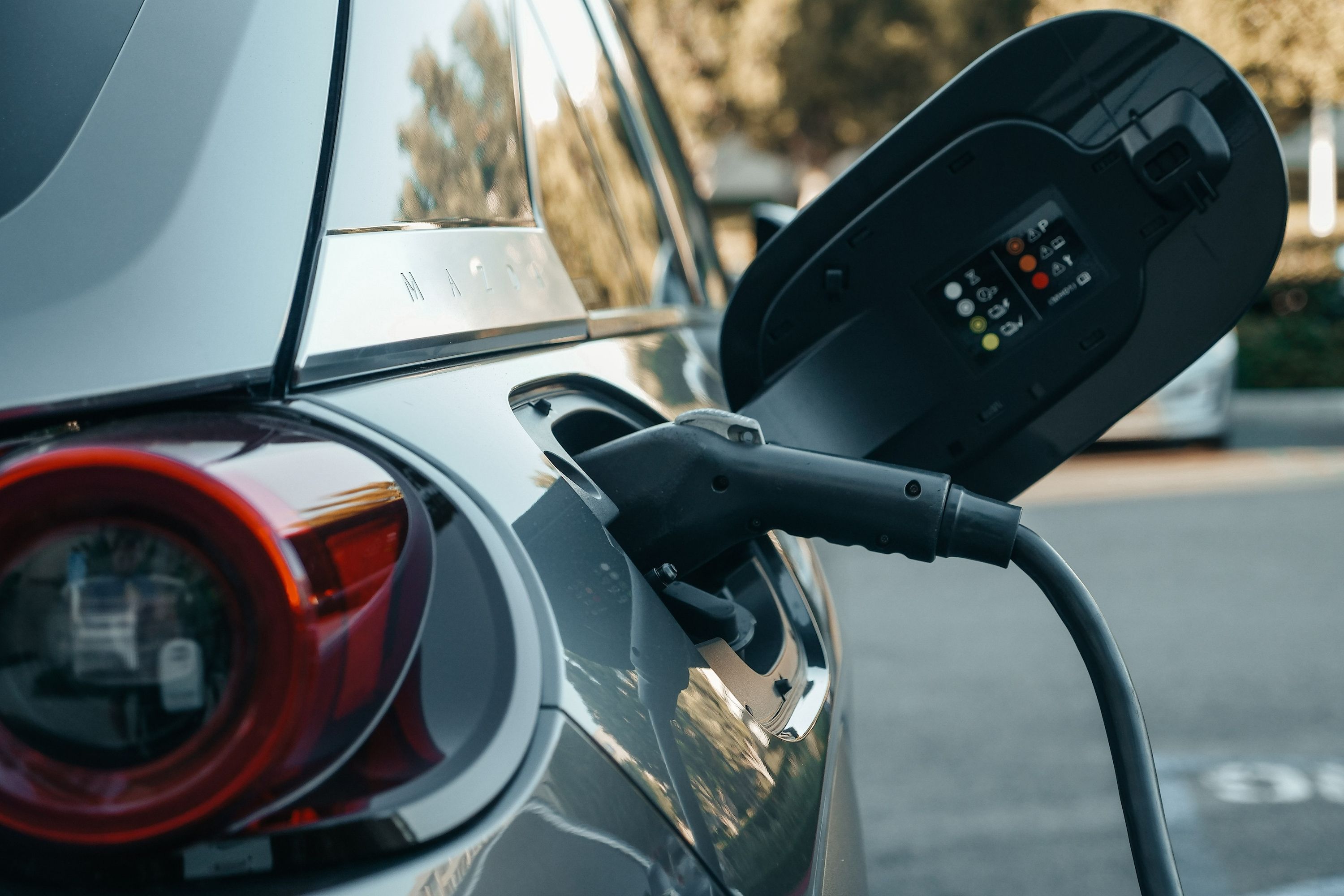 Mazda EV being charged