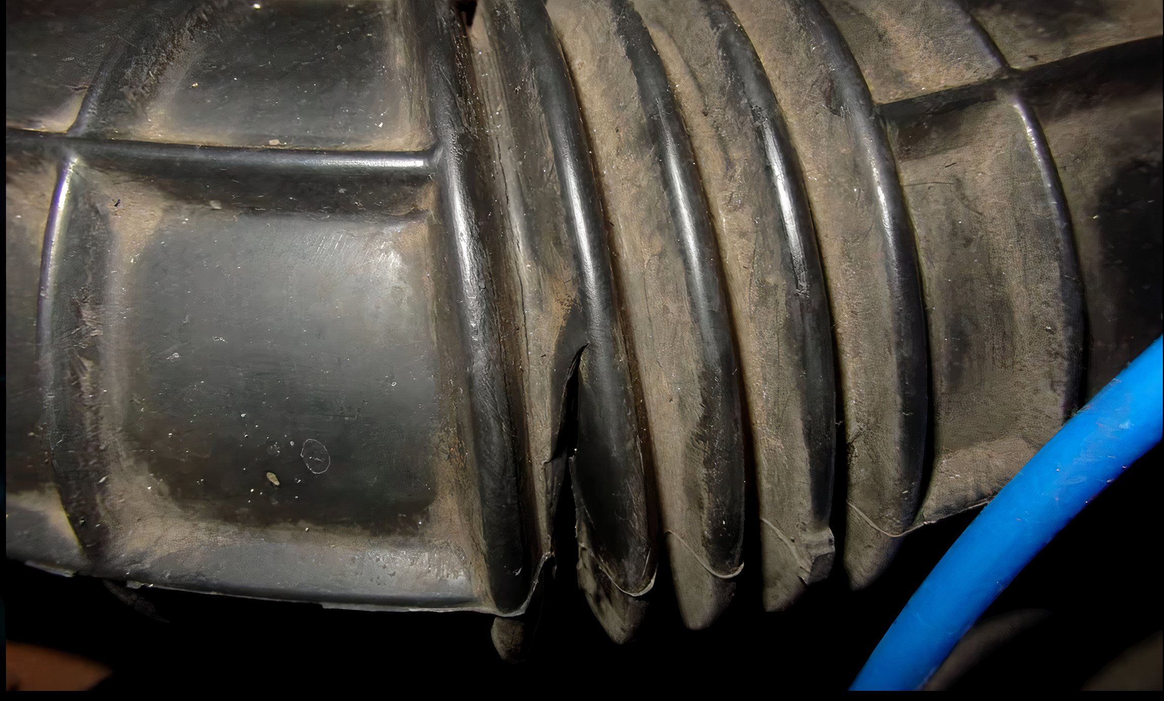 cracked-air-intake-hose-causing-vacuum-leak Cracked air intake hose causing vacuum leak