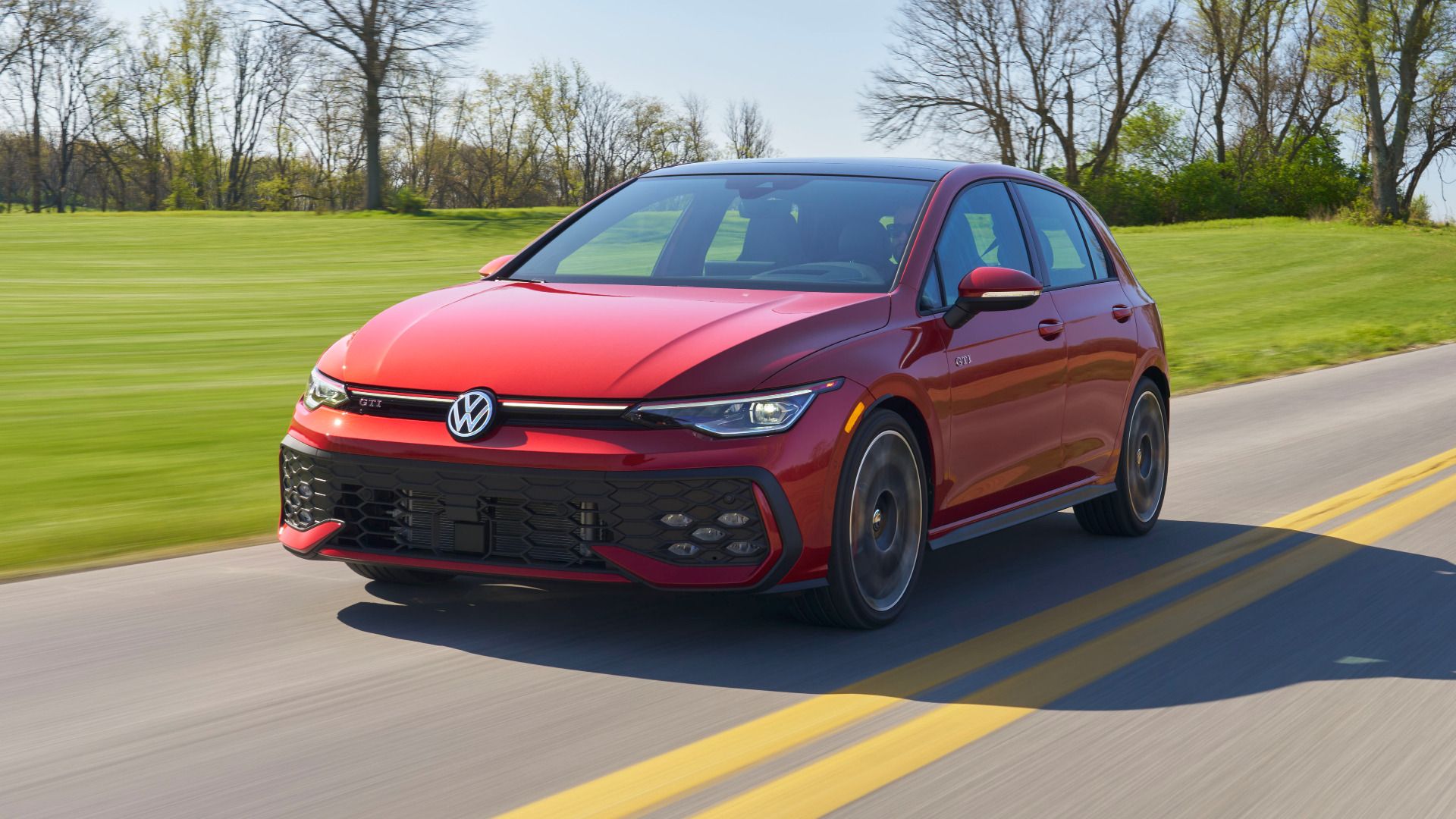cropped-original-18917-2025-golf-gti-autobahn-kings-red-metallic-19-1 2025 Volkswagen Golf GTI front three-quarter