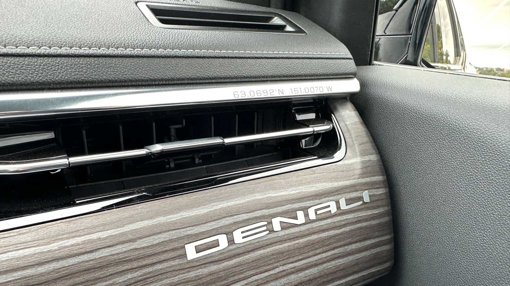 2025-gmc-sierra-ev-20 2025 GMC Sierra EV Denali interior badge