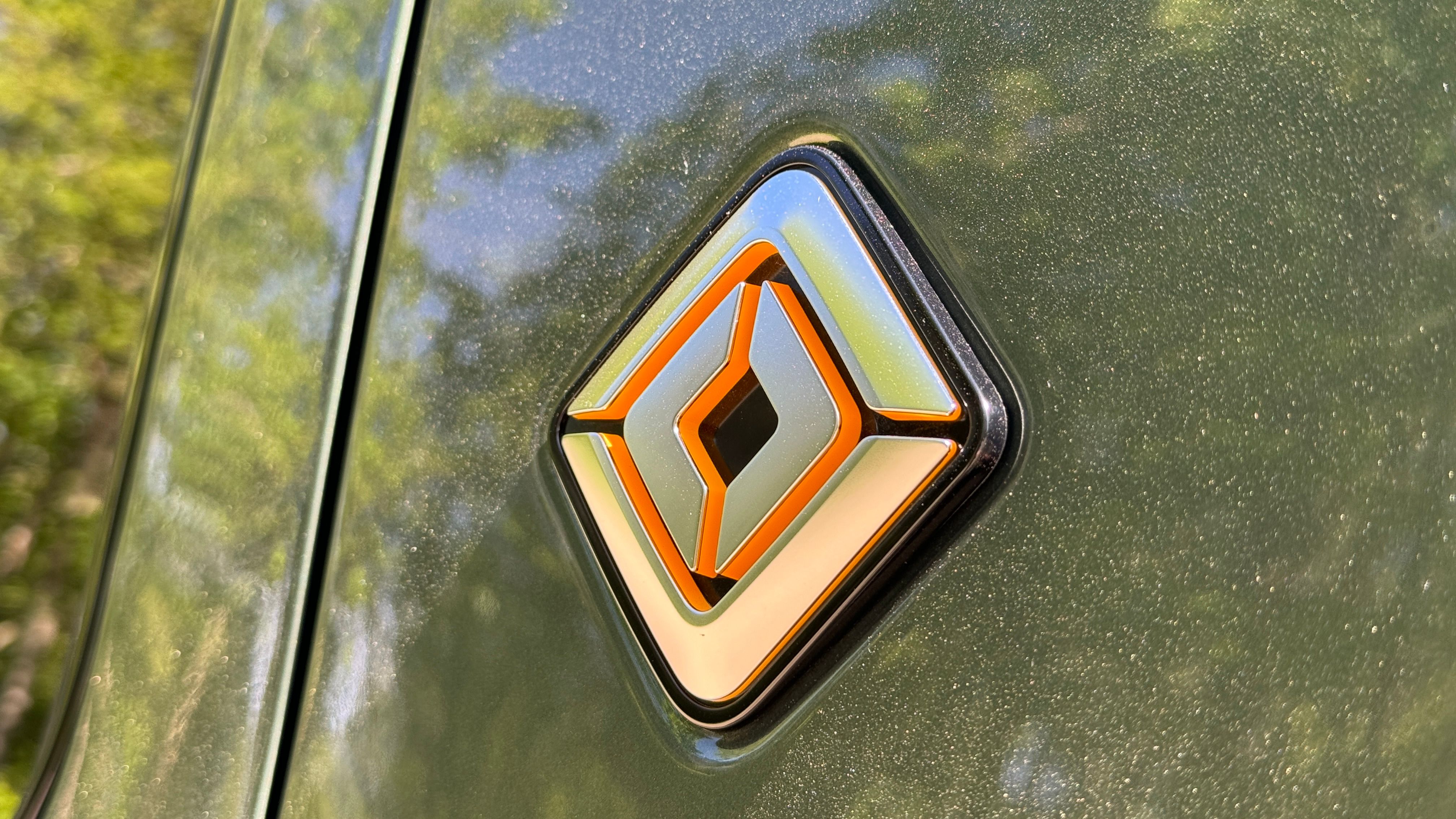 2025 Rivian R1S Rivian badge