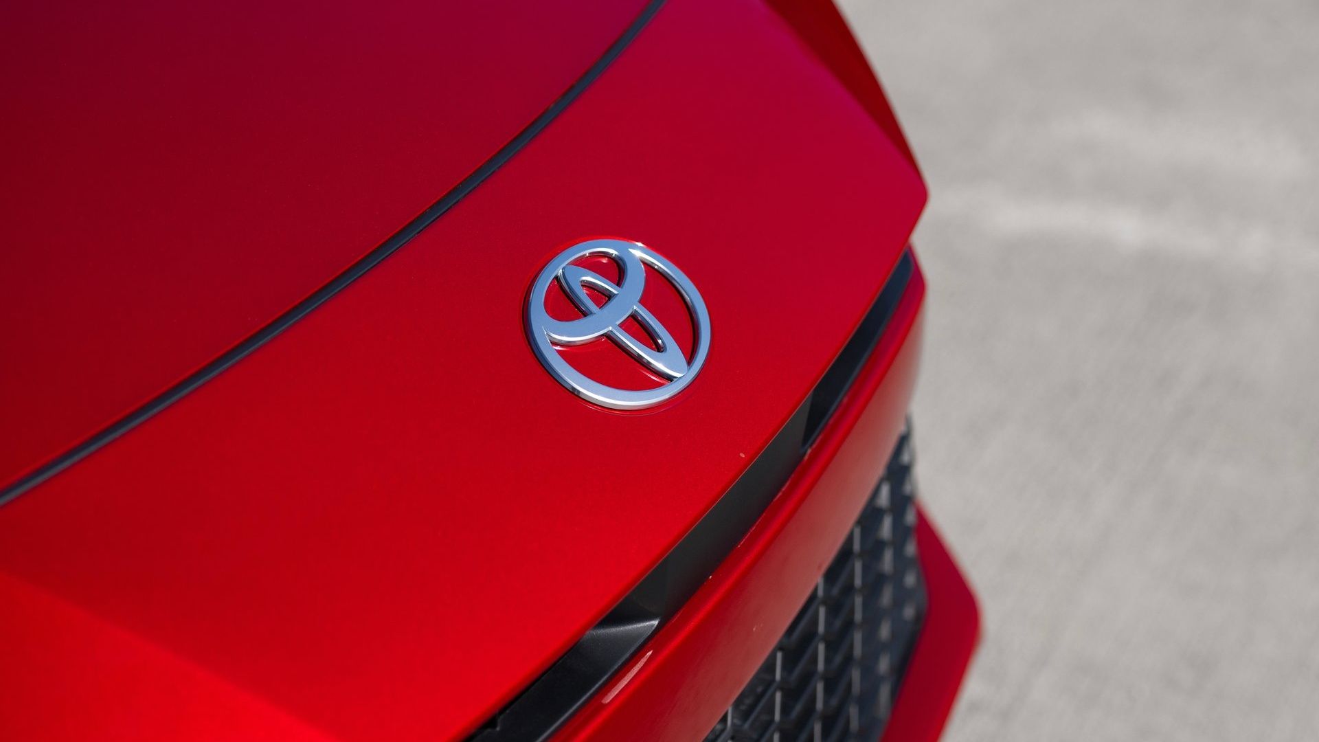 2025 Toyota Camry Red Front Badge Close-Up