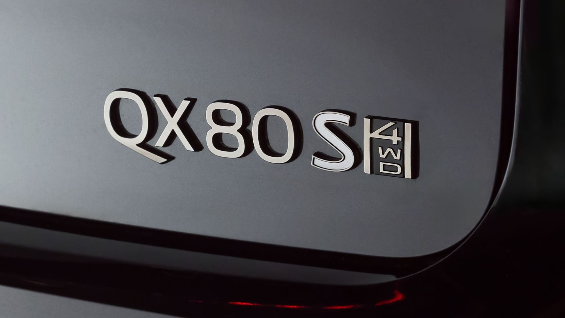 2026 Infiniti QX80 Sport Exterior Badge Closeup