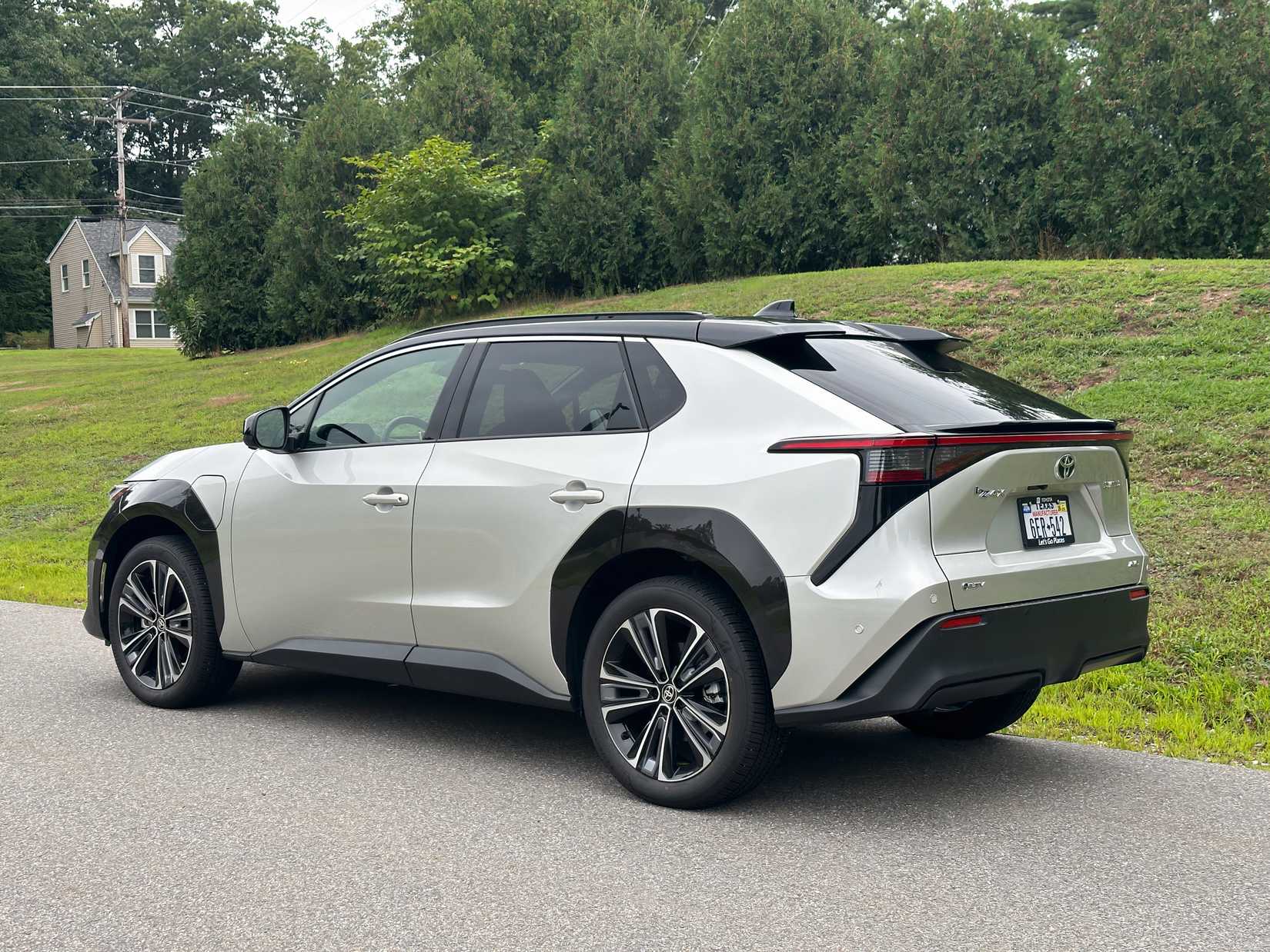 A rear three-quarter view of the 2024 Toyota bZ4X